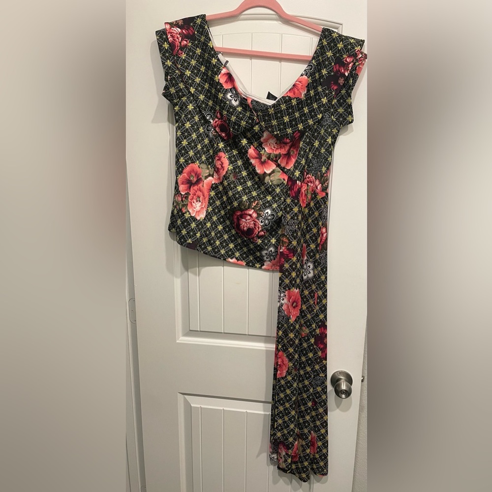 Gorgeous print blouse with side drape!